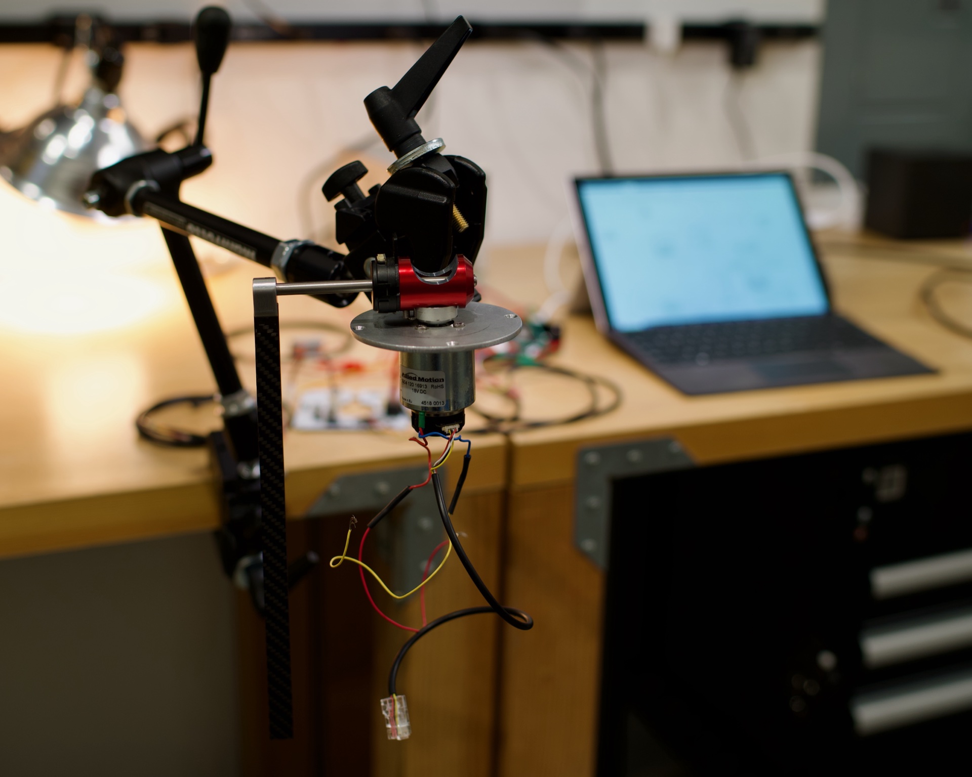 Motor and gimbal assembly on workbench